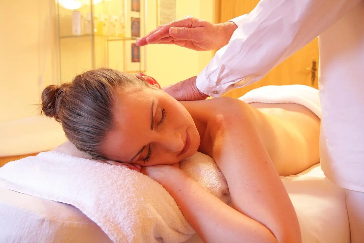Coko Balance - Rückenmassage einer Frau